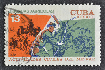 Cancelled postage stamp printed by Cuba, that shows Civil Activities of Cuban Army -  Harvesting...