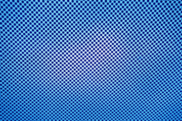 Dots on blue glass abstract pattern.