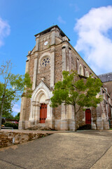 Fototapeta na wymiar Montbert. Façade de l’église Notre-Dame de l’Assomption. Loire-Atlantique. Pays de la Loire