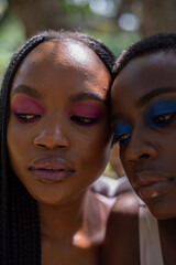 Close up portrait of two young african women 