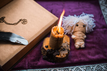 Concept of pagan magic, voodoo. Magical handmade doll .Witchcraft with a doll. 