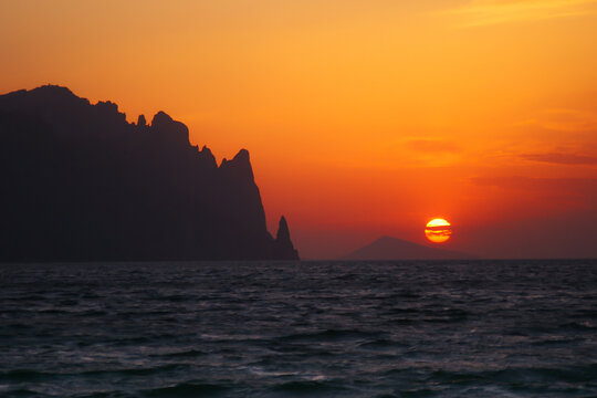Lisya Bukhta, Crimea, Ukraine - 15th of August 2008: Sunset over Karadag mountain. High quality photo