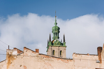 Tower of the Assumption Cathedral against the blue sky in Lviv, Ukraine.
