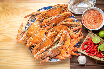 Seafood dish, steamed and cooked blue crab, served with Thai spicy and sour seafood dipping sauce. 