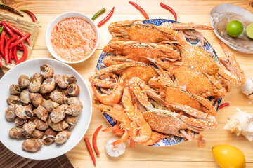 Seafood dish, steamed and cooked blue crab and areola babylon or spotted babylon , served with Thai...