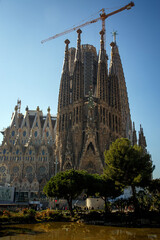 Construction of Sagrada Familia in Barcelona. Cranes above the church.