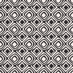 Black crooked rhombuses that alternate harmoniously draw a decorative tile diagonally.