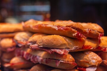 Serrano ham sandwich with whole wheat bread with seeds, food concept.