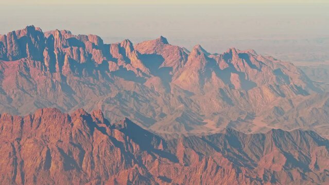 Panoramic top view of mountains of Sinai Peninsula. High peaks of Saudi Arabia rocks consisting of granites, gneisses, crystalline schists. Beautiful rocky landscape. Arabian ridge