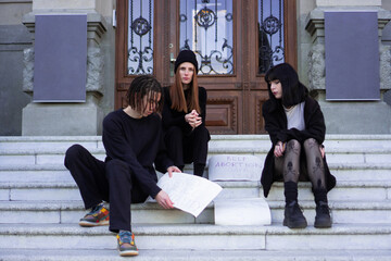 A group of students protested in front of the courthouse against sexism and police brutality.