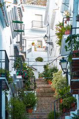 Fototapeta na wymiar Ansichten einer Treppengasse in Frigliana