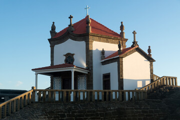 Capela do Senhor da Pedra or Lord of the rock chapel at sunset, Miramar, Portugal
