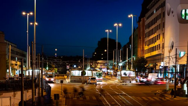 Time Lapse footage of busy main tram station during sunset in Brno, Czech Republic.