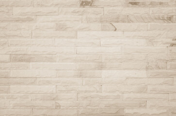 Empty background of wide cream brick wall texture. Old brown brick wall concrete or stone textured