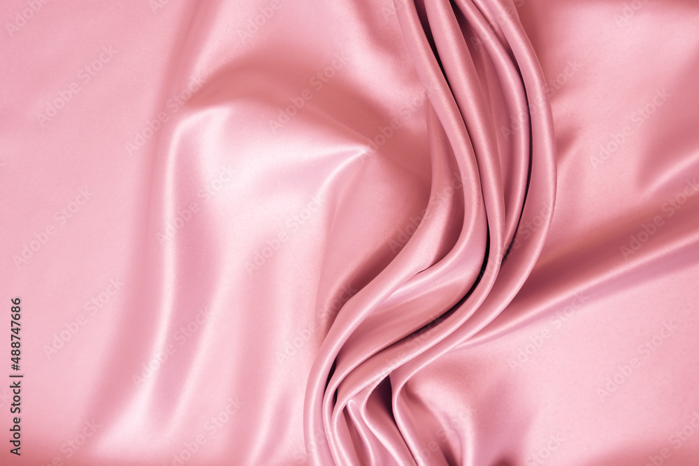 Wall mural beautiful elegant wavy light pink satin silk luxury cloth fabric texture with monochrome background 