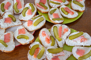 Sandwiches with cheese and red fish