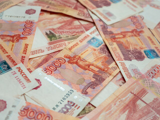 Fototapeta na wymiar Russian money background. Russian roubles, russian rubles cash closeup. Rubles in cash. Finance and business background. 5000 rubles. Money macro. 