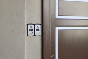 Wooden door. Outdoor Video Intercom Door Station on the wooden wall. Built-in IC card reader. Selective focus