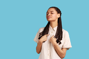 Its me. Boastful woman with dreadlocks pointing at herself, proud of own achievements, looks...