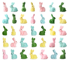 Different Easter bunnies on white background