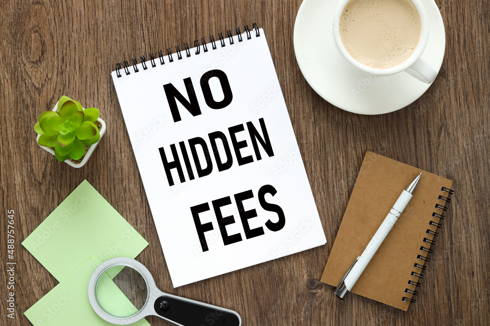 Poster no hidden fees. text about operation notepad on wooden worktable
