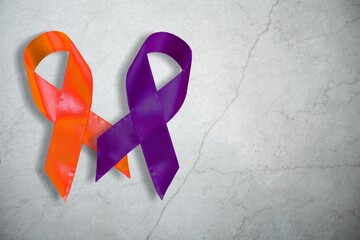 February awareness month campaign with purple and orange ribbon concept