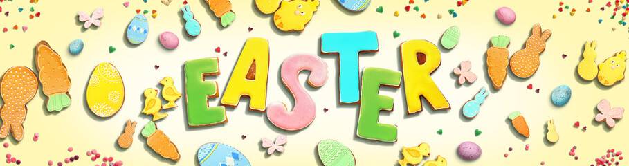 Word EASTER made of cookies on white background