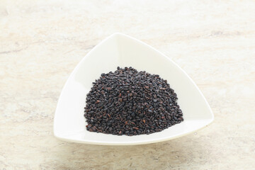 Black sesame seeds in the bowl