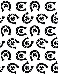 Vector seamless pattern of horseshoe and trefoil isolated on white background