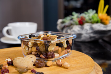 healthy organic nuts stand in storage container on the table