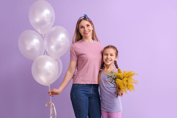 Little girl, her mother with flowers and balloons on lilac background