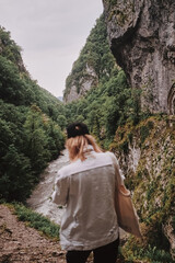 Taking photo. Girl from back