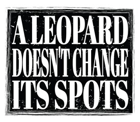 A LEOPARD DOESN'T CHANGE ITS SPOTS, text on black stamp sign