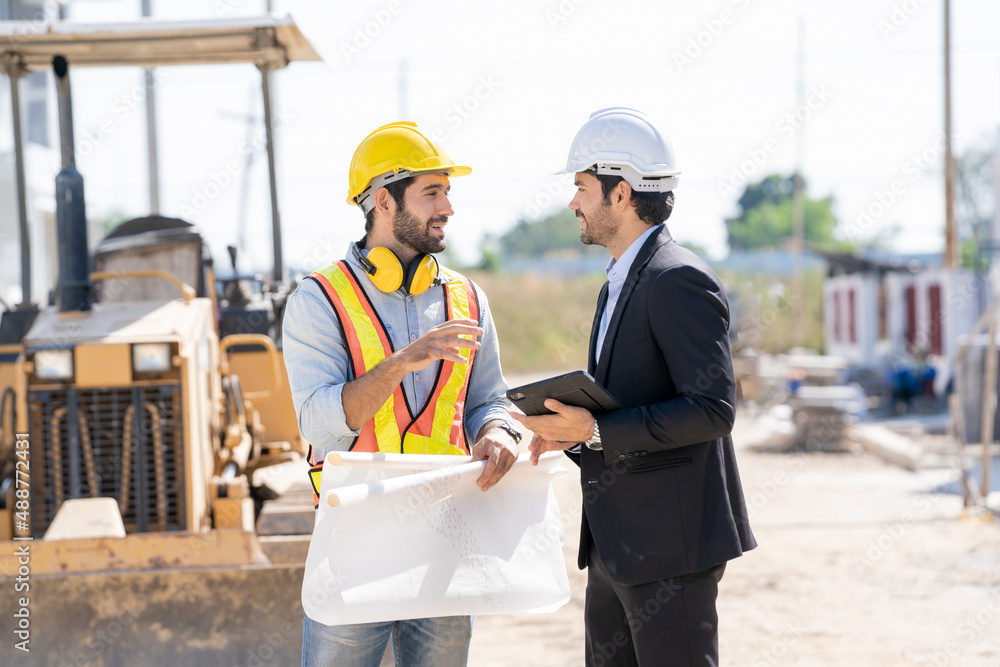 Leinwandbilder businessman and engineer discussing architect project at construction site,development and construct