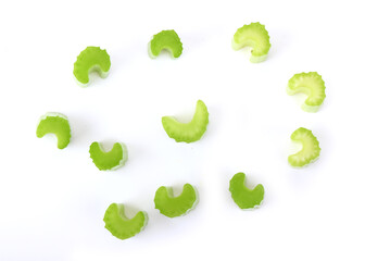Cut celery sticks on white background