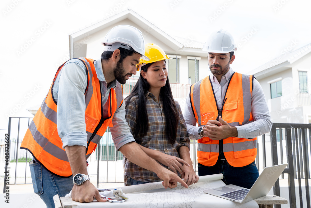 Aufkleber engineer working on construction building site,architects discussing project of building outdoors.