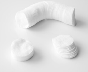 The Cotton pads on the white background
