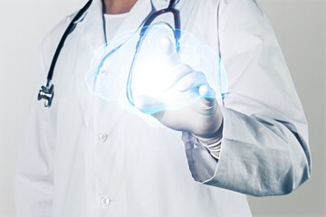 A doctor holding virtual volumetric drawing of  Brain in hand. Healthcare hospital service concept