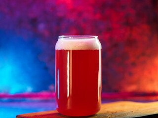 A glass of craft red beer. Berry sour red ale