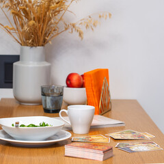 Blurred Tarot cards layout on the table. Esoteric concept and astrology