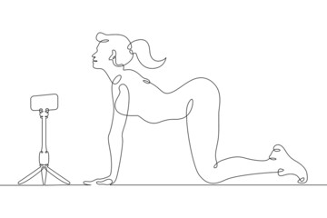Fitness blogger leads a workout.One continuous line.Blogger female character. Internet blogging, online broadcasting.Continuous line drawing.Line Art isolated white background.