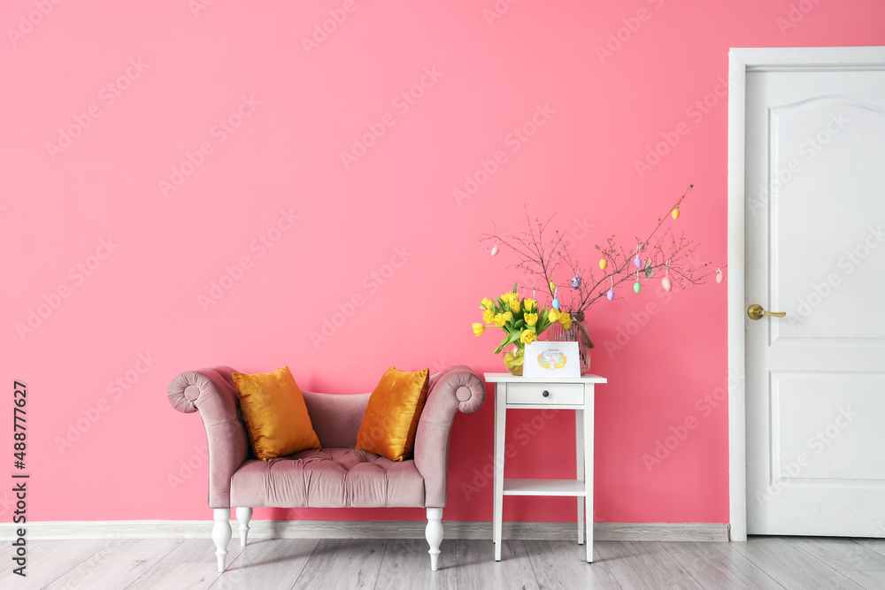 Canvas Prints interior of room with stylish armchair, tulips and tree branches with easter decor