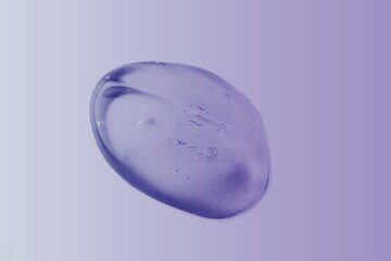 Liquid purple gel cosmetic smudge texture on desk