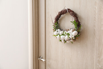 Beautiful Easter wreath hanging on door