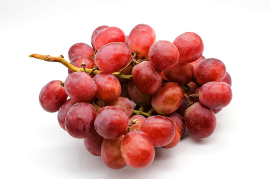 bunch of red grapes on white background
