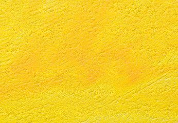 Wall scratched texture painted by yellow spray paint