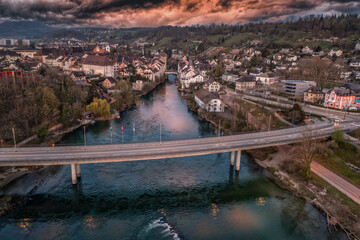 bridge over the river  with view of a medieval town 
