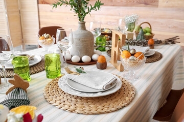 Stylish dinnerware on table served for Easter celebration