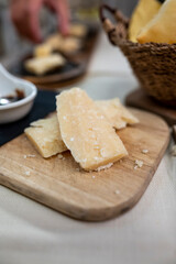 Tasting of different matured and old parmesan Parmigiano-Reggiano hard cheese in Parma, Emilia Romagna, Italy