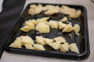 Process of making parmigiano-reggiano parmesan cheese on small cheese farm in Parma, Italy, tastig...